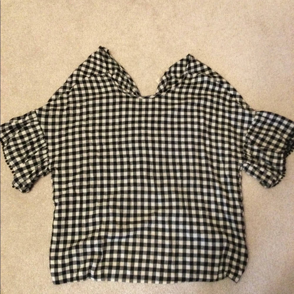 Black and white checked top.